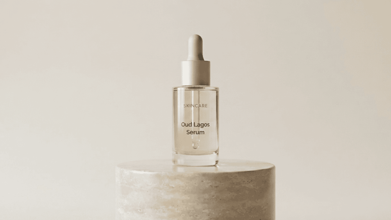 Oud Lagos Serum dropper bottle on a stone pedestal